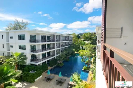 The Title | Furnished One Bedroom Top Floor Condo with Partial Sea Views and Steps to Rawai Beachfront 