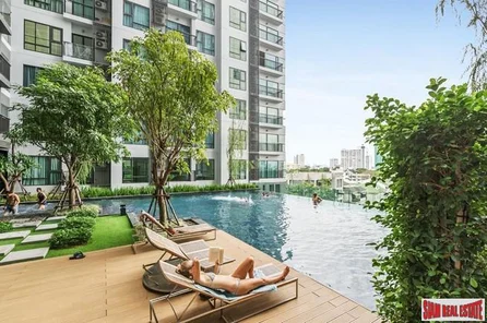 Rhythm Sukhumvit 36 | Comfortable One Bedroom Thong Lo Condo for Sale with City & Pool Views