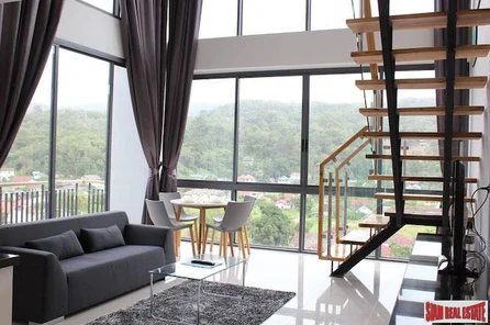 Icon Park Condominium | Two Bedroom Kamala Duplex with Large Open Windows and Green Views