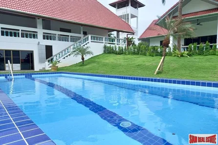 Two buildings with Eight Bedrooms and Large Swimming Pool for Sale in a Peaceful Area of Rawai