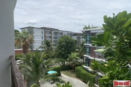 The Title | Two Bedroom Corner Unit with Pool View for Rent in Rawai