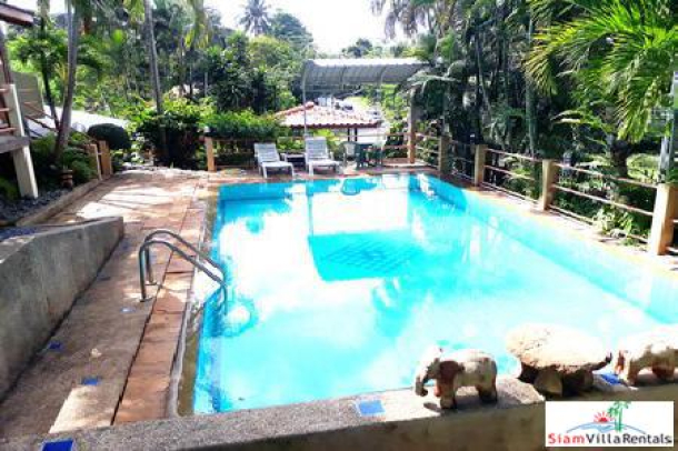 One bedroom Apartment  with a Shared Swimming Pool in  Nai Harn-1