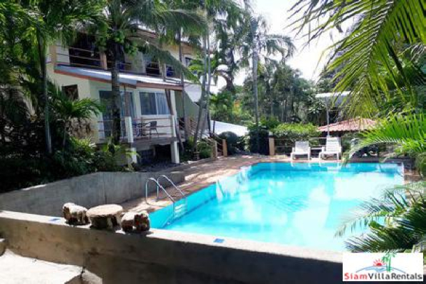 3 Bedroom Ground Floor Apartment with a Shared Swimming Pool for Long Term Rent at Nai harn-1