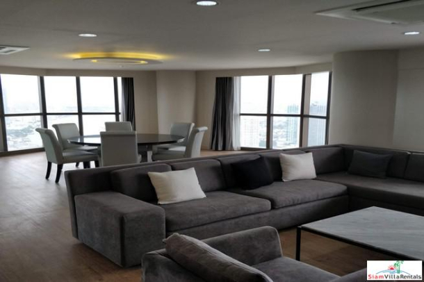State Tower | 2 Bedroom, 2 Bathroom High Rise Condo on the 47th floor, Chaopraya River and City View with nice Balconies, Fully Furnished, Silom-1