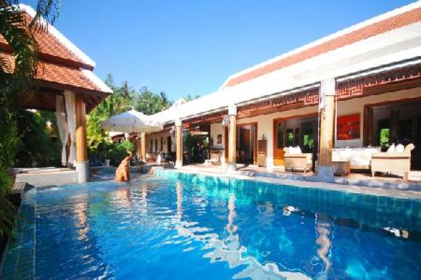 Seven Bedroom Mansion with Private Swimming Pool and Extensive Gardens at Nai Harn For Sale-1