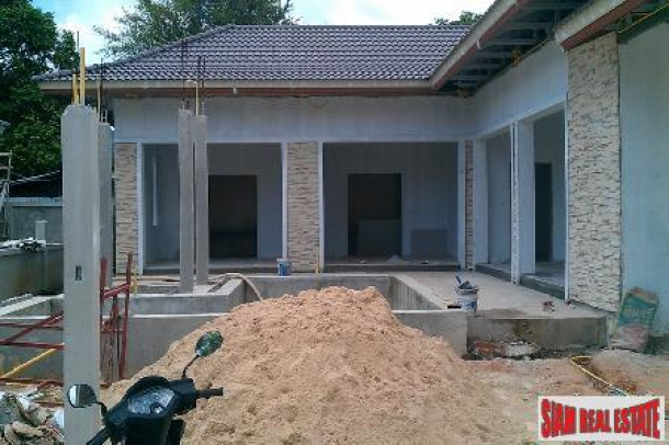 Three Bedroom Modern Thai Pool Villas in New Rawai Development-13