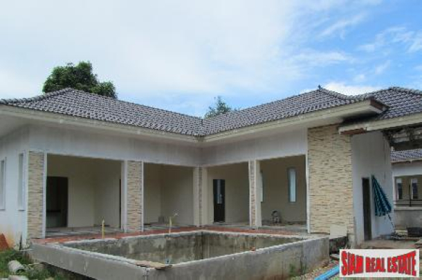 Three Bedroom Modern Thai Pool Villas in New Rawai Development-16