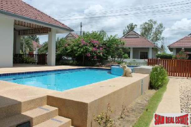 An affordable pool villa in a small development for sale.-12