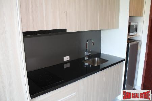Excellent Cut-Price Condo Available In The Highly Desirable Wong Amat Area of North Pattaya-4