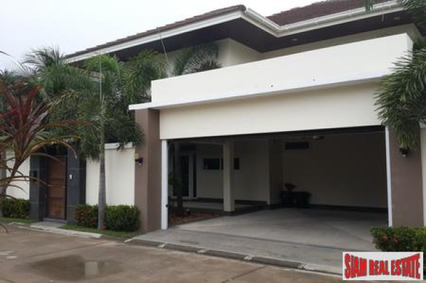 Modern four-bedroom private pool villa with jacuzzi and located near the beach-1