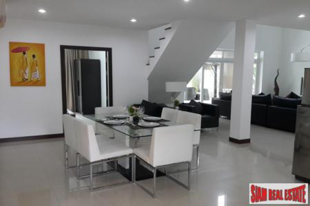 Modern four-bedroom private pool villa with jacuzzi and located near the beach-8