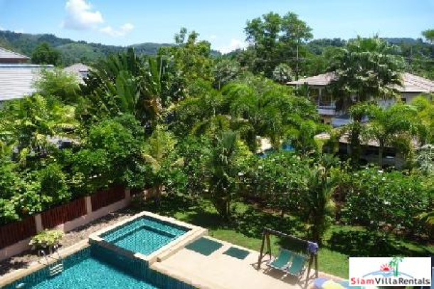 Four-bedroom private pool villa located near golf course and international schools-7
