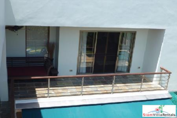 Four-bedroom private pool villa located near golf course and international schools-9