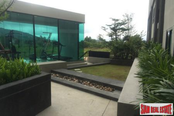 ZCape | One Bedroom Modern Apartment in the Heart of Cherng Talay with Communal Pool and Gym-4