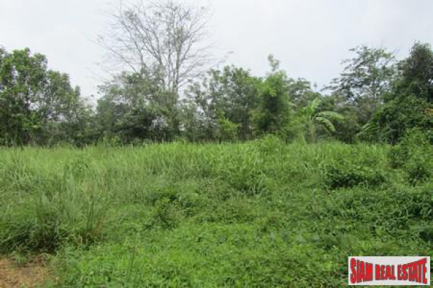 Gently sloping 2 rai area of land in Cherng Talay-3