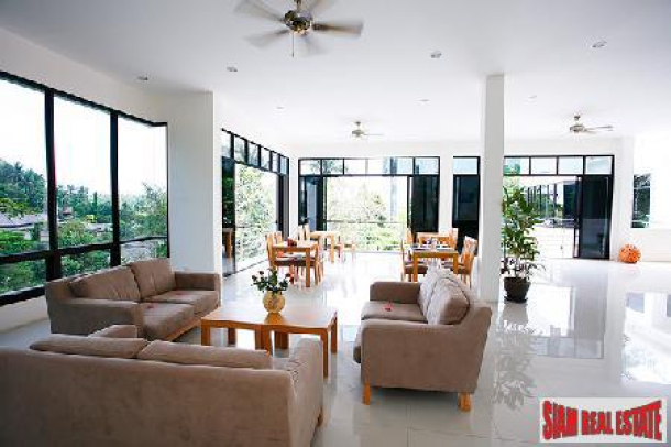 Modern studio Kamala apartment in tranquil complex with garden view-17