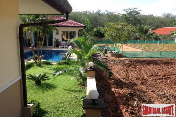 Four Bedroom Pool Villa with Guest Suite in Thalang-13