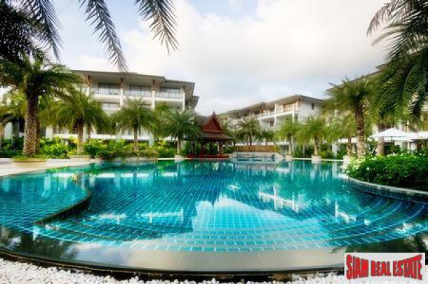 Pearl of Nai Thon | On the Beach an Elegant Four-Bedroom Condo for Sale i-1