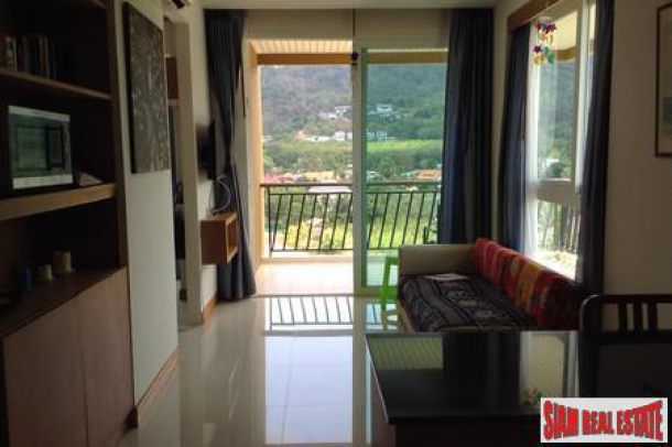 Saiyuan | Panoramic Mountain View, Modern and Elegant One-Bedroom Rawai Condo for Sale-12