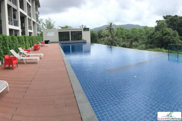 Elegant 100 sqm Two-Bedroom Condo for Rent in Phuket Town Overlooking the Natural Park-28