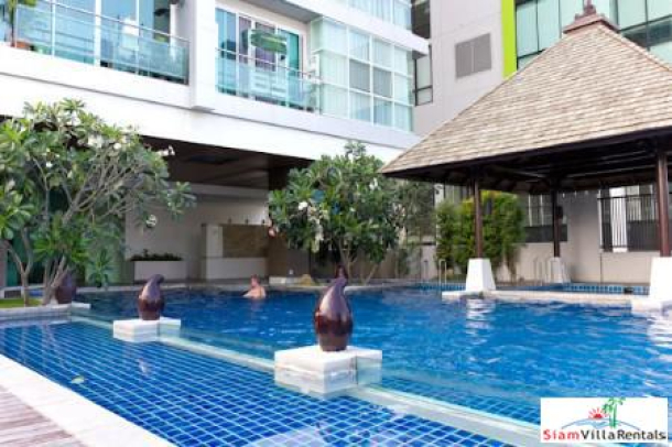 Prime 11 | Contemporary Two Bedroom Condo with Pool Views for Rent in Nana-1
