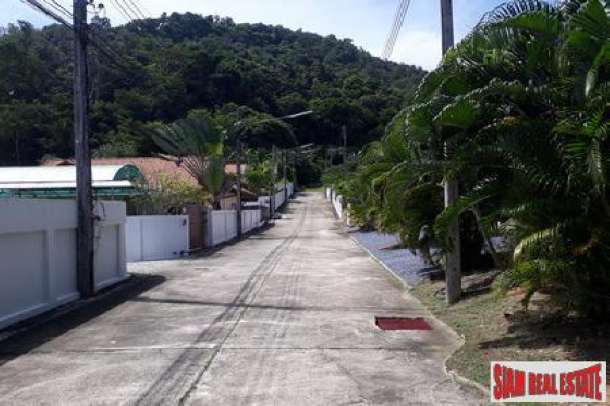 1,350 sqm Land with 3 Houses in a Desirable Area of Rawai, Phuket-6