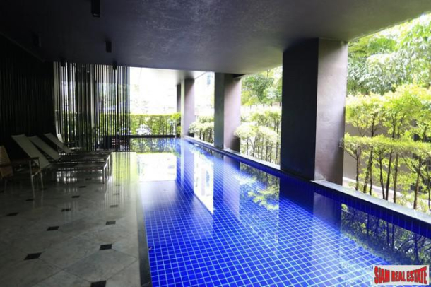 Noble Reveal Condominium | Two Bedroom Corner Condo with Wrap Around Windows and Fantastic City Views in Ekkamai-1