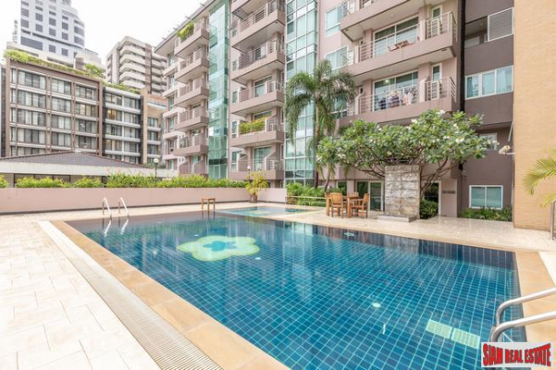 Beautiful Two Bedroom Condo with Wood Accents Throughout in Phrom Phong-1
