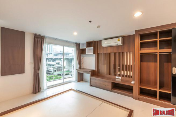 Beautiful Two Bedroom Condo with Wood Accents Throughout in Phrom Phong-12