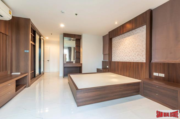 Beautiful Two Bedroom Condo with Wood Accents Throughout in Phrom Phong-13
