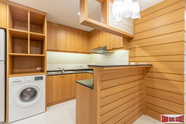Beautiful Two Bedroom Condo with Wood Accents Throughout in Phrom Phong-18
