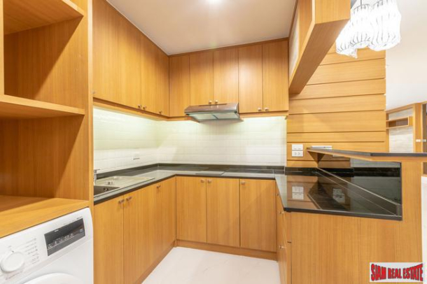 Beautiful Two Bedroom Condo with Wood Accents Throughout in Phrom Phong-19