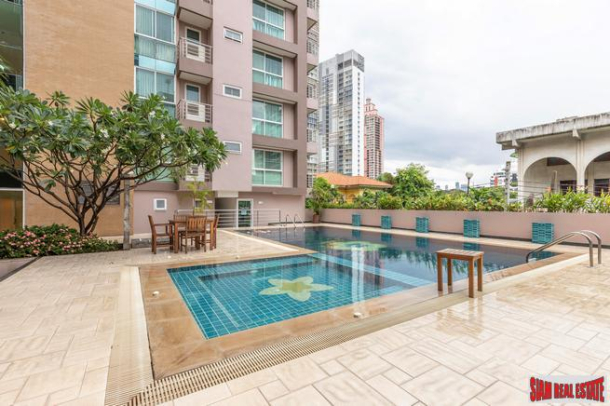 Beautiful Two Bedroom Condo with Wood Accents Throughout in Phrom Phong-20