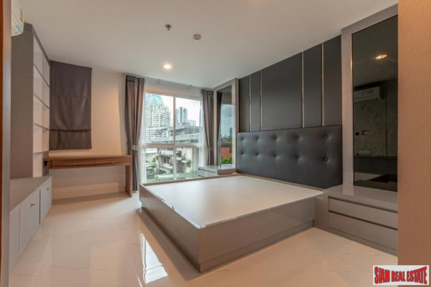 Beautiful Two Bedroom Condo with Wood Accents Throughout in Phrom Phong-6