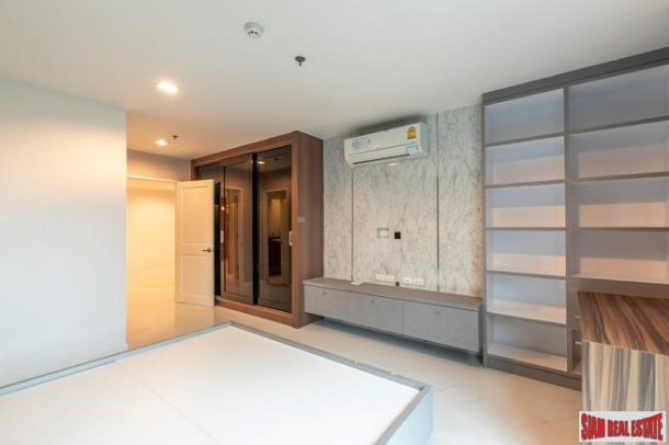 Beautiful Two Bedroom Condo with Wood Accents Throughout in Phrom Phong-7