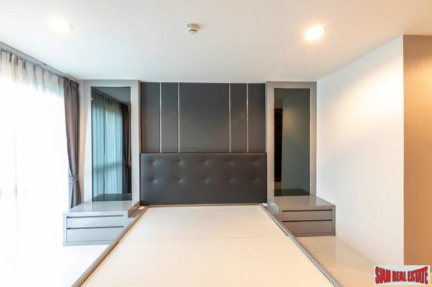 Beautiful Two Bedroom Condo with Wood Accents Throughout in Phrom Phong-9