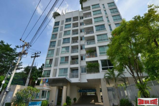 49 Plus 2 | Spacious Top Floor One Bedroom Condo with City Views in Thong Lo-1