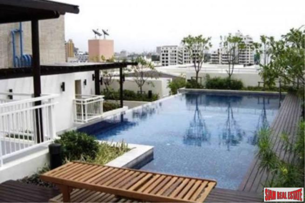 49 Plus 2 | Spacious Top Floor One Bedroom Condo with City Views in Thong Lo-8