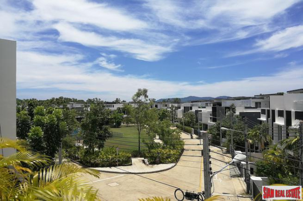 Three Bedroom Three Storey House with Roof Top Terrace, Communal Pool & Mountain Views in Laguna-4