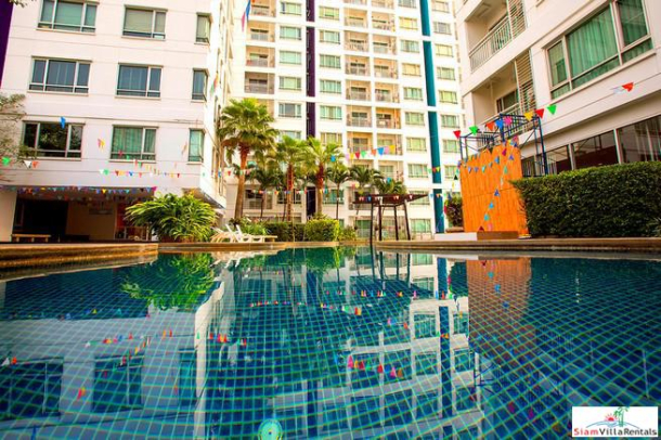 Sukhumvit Plus | Two Bedroom, Two Bath Condo with Wood Paneling and Floors near BTS Phra Khanong-1