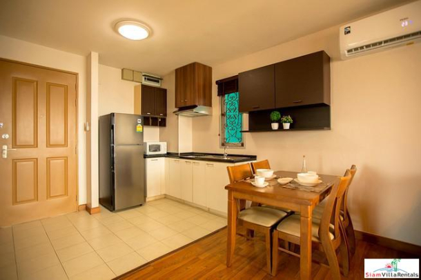 Sukhumvit Plus | Two Bedroom, Two Bath Condo with Wood Paneling and Floors near BTS Phra Khanong-5