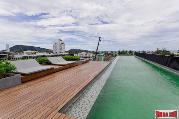 The Deck | Unique Condo with Two Swimming Pools, Gym and Close to the Beach in a Prime Patong Location-1