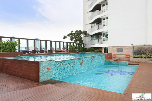 Convenient and Comfortable Two Bedroom Condo for Rent with Lots of Wood Accents in Lumphini-13