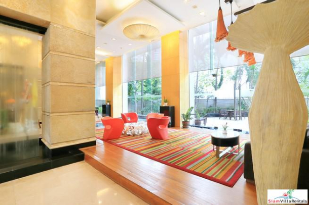 Convenient and Comfortable Two Bedroom Condo for Rent with Lots of Wood Accents in Lumphini-6