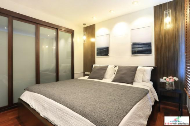 Convenient and Comfortable Two Bedroom Condo for Rent with Lots of Wood Accents in Lumphini-8