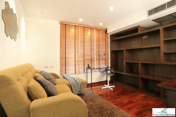 Convenient and Comfortable Two Bedroom Condo for Rent with Lots of Wood Accents in Lumphini-9