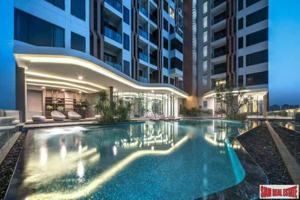 Newly Completed High-Rise Condo by Leading Developers at Chatuchak Park Area close to BTS and MRT, Excellent Facilities including Sport Arena - 2 Bed Units - Free Furniture and Electronics!-2