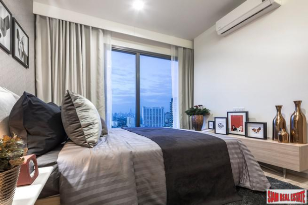 Newly Completed High-Rise Condo by Leading Developers at Chatuchak Park Area close to BTS and MRT, Excellent Facilities including Sport Arena - 2 Bed Units - Free Furniture and Electronics!-8