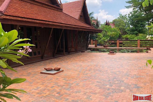 Traditional Thai Style House with Six Bedrooms and Wrap Around Terrace for Sale in Laksi-12