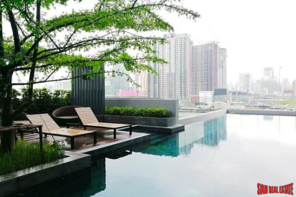 Chewathai Residence Asoke | Brightly Decorated City View Condo with Loft-style Bedroom near MRT Rama 9-16